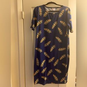 LulaRoe dress size XL. Navy Blue background with design of feathers.